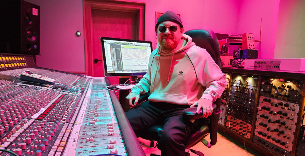 An image of Ari Judah in the recording studio.